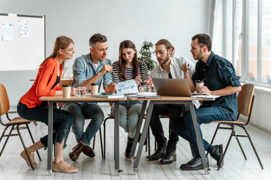 A team of colleagues collaborating during a meeting