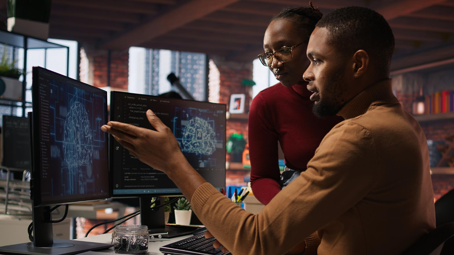 The professionals are working in an AI startup office to build applications